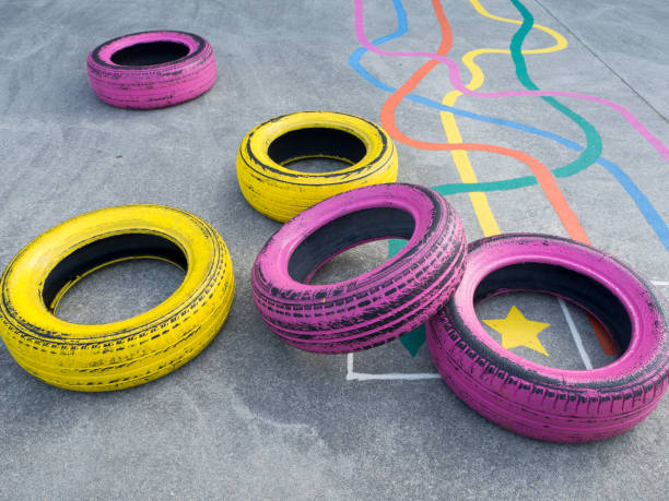 istock Colorful tires and games in a playground 1073296522