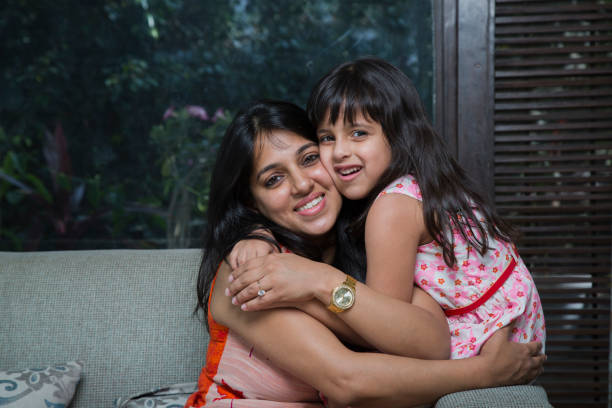 istock Mother and daughter at home - Stock image 1073302490