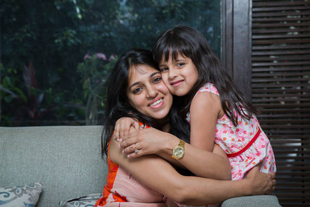 istock Mother and daughter at home - Stock image 1073306904