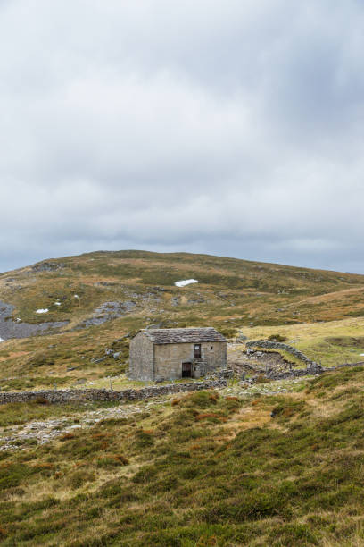 istock House in a mountain autumn landscape 1073311442