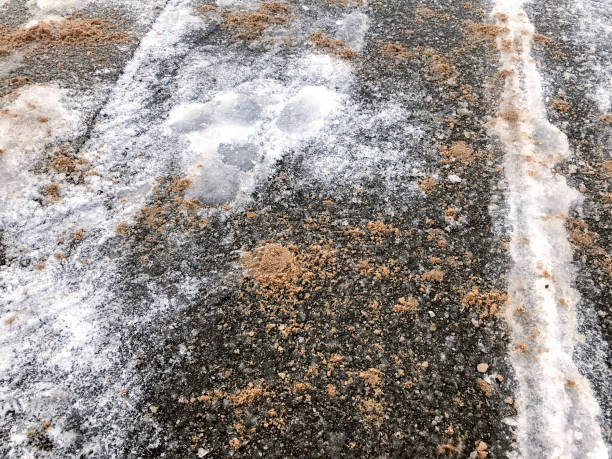 istock Slippery ice and snow on the sidewalk 1073317680