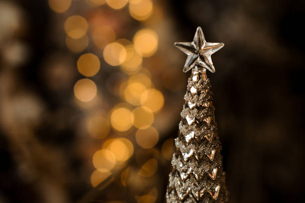 istock Top of the silver metal tree with star 1073320884