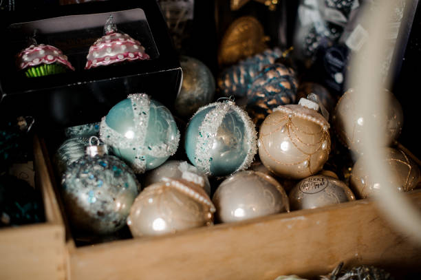 istock Box of many silver blue and beige toy bulbs 1073322716