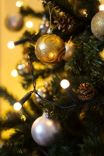 istock Christmas decorations on the branches fir, christmas background and lights. 1073325794