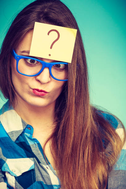 istock Thinking woman with big eyeglasses and light bulb 1073332506