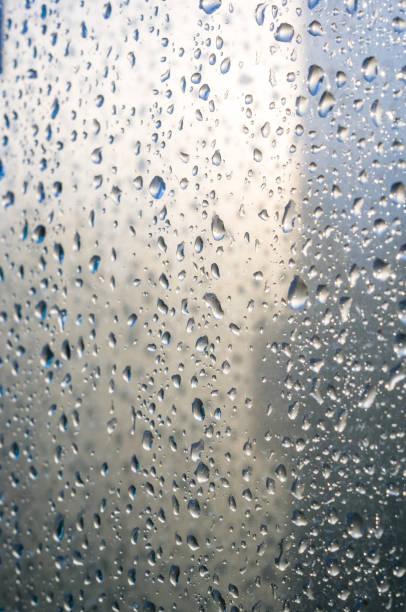 istock background of raindrops on window glass, close up 1073332790