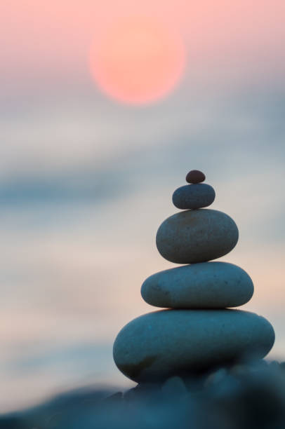 istock stack of zen stones on pebble beach 1073333244