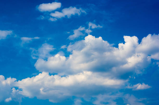 istock beautiful background bright blue sky with white clouds 1073342502