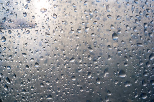 istock background of raindrops on window glass, close up 1073343678