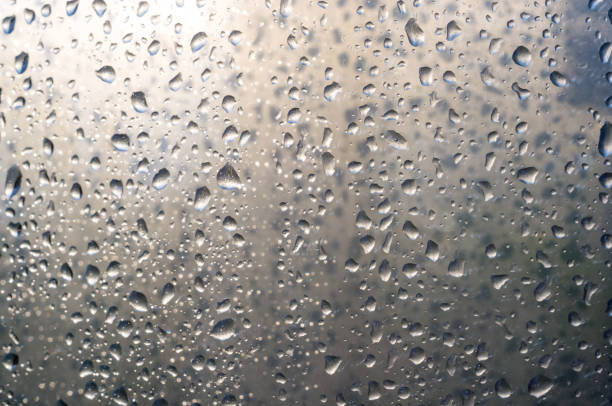 istock background of raindrops on window glass, close up 1073349280