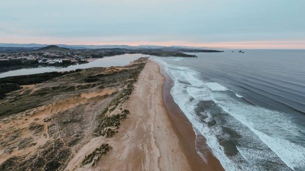 istock Large sand beach as seen from above 1073366428