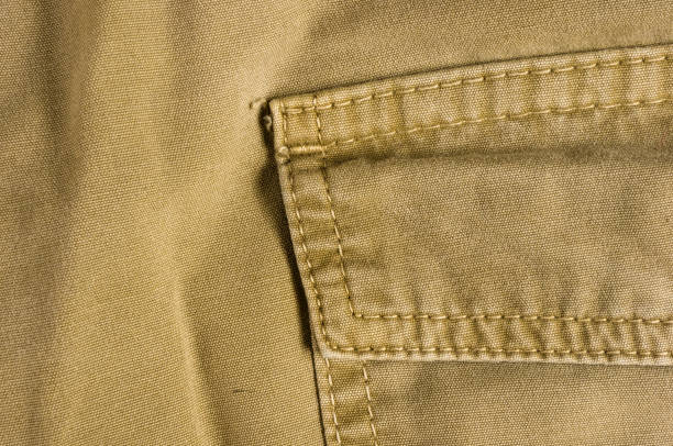 istock clothing items washed cotton fabric texture with seams 1073366668