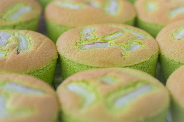 Close up row of Green cup cake stock photo