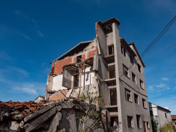 istock Old destroyed an abandoned multi-storey building in a military town 1073369894
