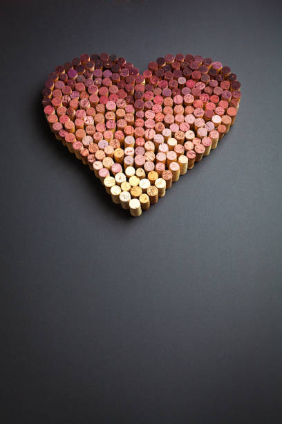 istock Wine Corks Arranged in Heart Shape on gray Background 1073376118
