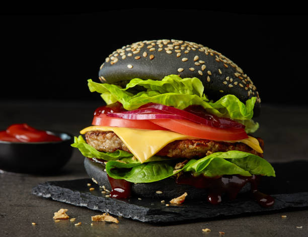 istock fresh tasty black burger 1073377646