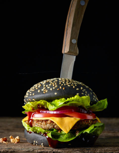 istock fresh tasty black burger 1073377666
