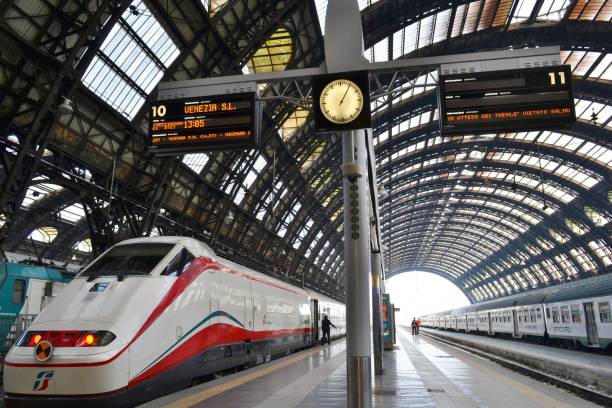 Freccia Argento - White Arrow - high speed train is ready for departure to Venice in the Milan Central railway station. Milan/Italy - January 15, 2014: Freccia Argento - White Arrow - high speed train is ready for departure to Venice in the Milan Central railway station. Eurostar stock pictures, royalty-free photos & images