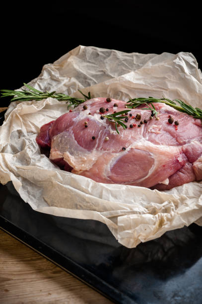 istock fresh meat on a wooden board. Steak, ribs polar bear, heel 1073385942