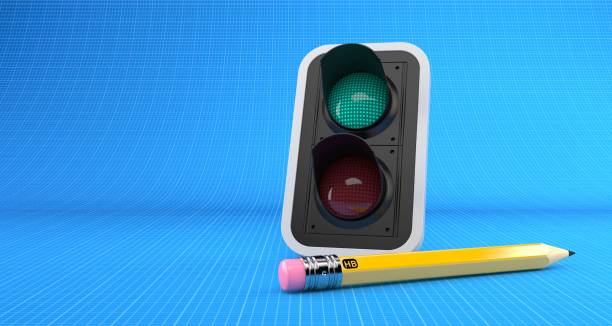 istock Green traffic light with pencil on blueprint background 1073388022