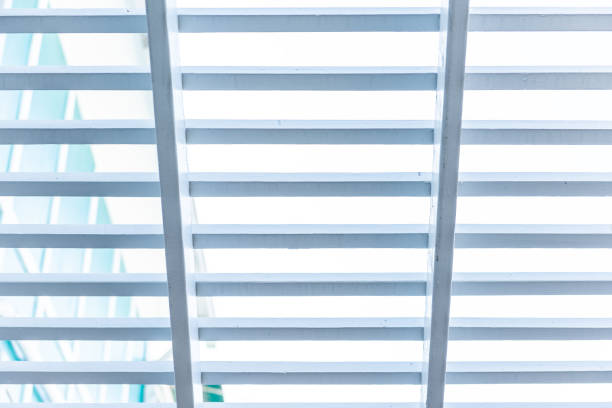 istock Pastel blue turquoise abstract ceiling roof beams architecture closeup outdoors in Seaside, Florida, pattern, texture looking up low angle 1073388564