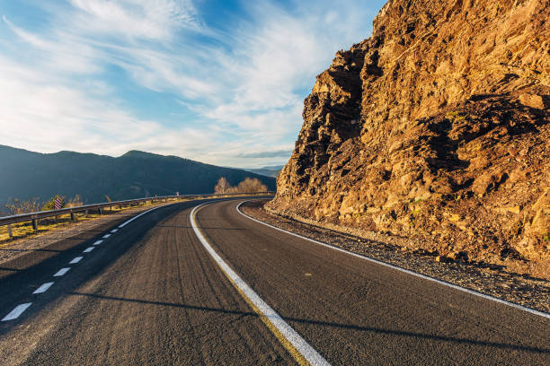 istock Turning mountain road 1073391060