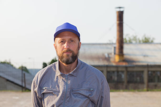 istock industrial manufacturing factory worker posing 1073391072