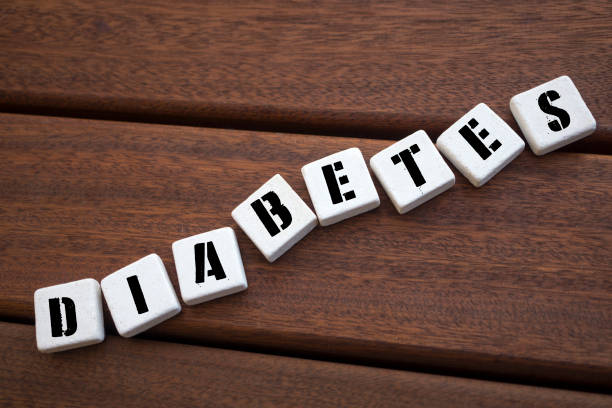 istock DIABETES Concept with alphabet blocks on wooden table. 1073400164