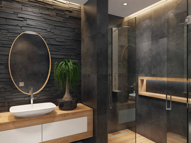 istock Luxurious minimalist bathroom with slate black stone wall 1073403362