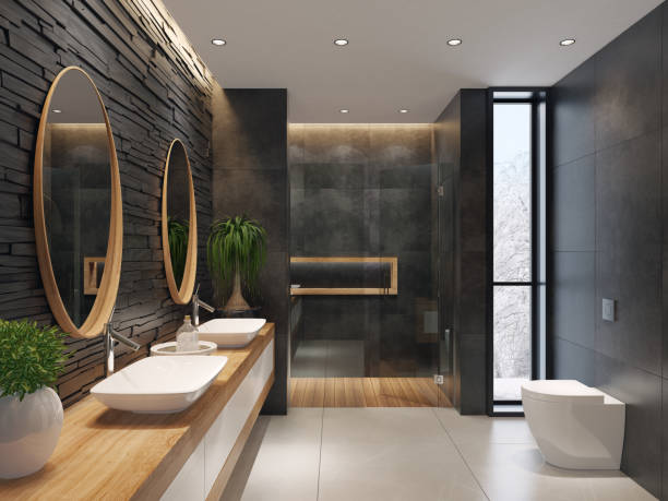 minimalistische luxusbadezimmer mit schiefer schwarz steinmauer - indoors bathroom inside of contemporary stock-fotos und bilder
