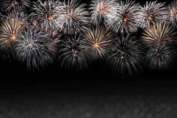 istock Background New Year's texture black with salute, fireworks. 1073405078