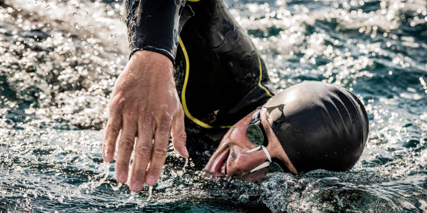 istock Swimmer taking a breath during a freestyle stroke 1073406098