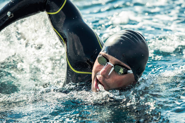 istock Swimmer taking a breath during a freestyle stroke 1073406322