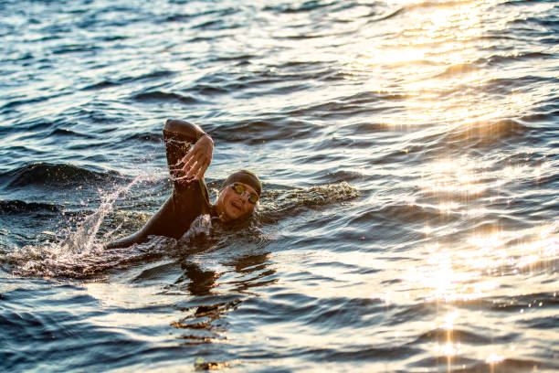 istock Swimmer taking a breath during a swim in the sea 1073406332