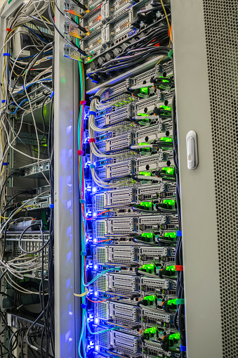 Vertical Racks With Modern Computer Equipment Are In The Server Room ...