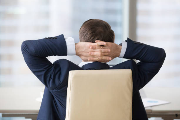 istock Feeling success or satisfaction or dreaming or relaxing in office 1073415870