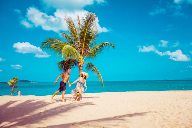 istock Couple on tropical beach 1073416270