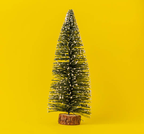 istock toy pine christmas tree on color background with free copy space for your creativity ideas text festive background 1073420414