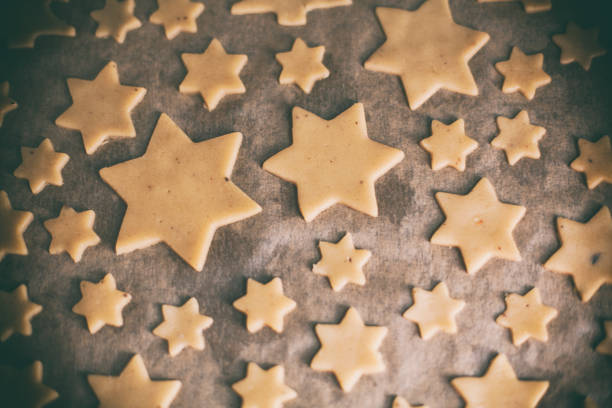 Pastry for Christmas cookies and cookie cutters.