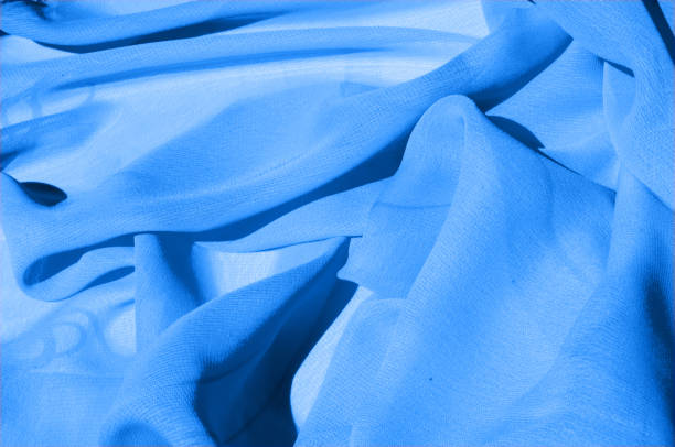 istock Background texture, pattern. Azure Blue Silk Twill. Here is a deluxe azure blue silk twill perfect for a vast array of applications. Almost as soft as a cloud, this remarkable silk has a supreme drape 1073441152