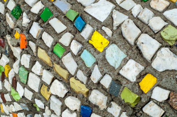 istock Texture, background, pattern. Closeup photo of multi-colored mosaic stones. Structure design decor. Swimming pool wall and floor finishing 1073441168
