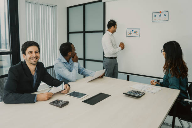 istock Positive Hispanic manager enjoying business seminar 1073454696