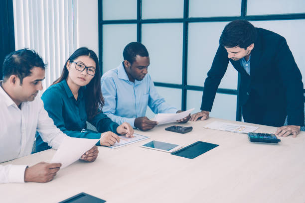 istock Multiethnic business group working on new strategy 1073454772