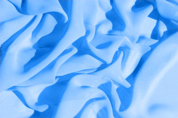 istock Background texture, pattern. Azure Blue Silk Twill. Here is a deluxe azure blue silk twill perfect for a vast array of applications. Almost as soft as a cloud, this remarkable silk has a supreme drape 1073467946