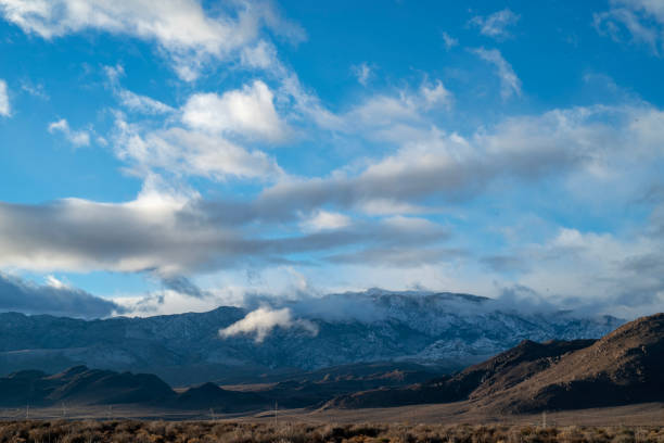 istock cloudy November sky over eastern Sierra Nevada mountains, hills 1073471866