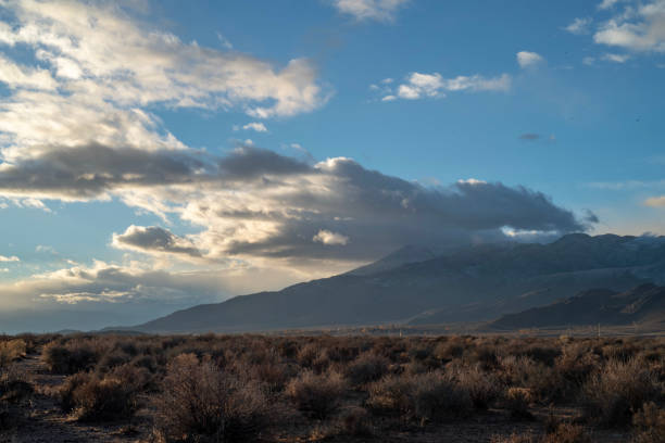 istock cloudy November sky over eastern Sierra Nevada mountains, hills 1073473914