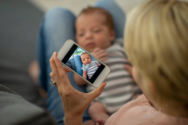 istock Taking Picture Of Baby 1073474542