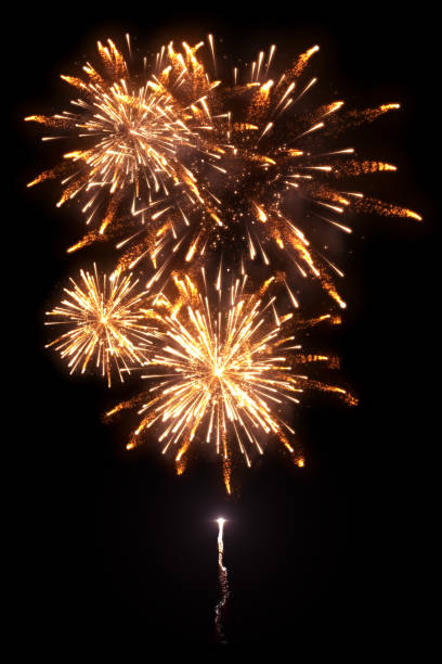istock Beautiful golden fireworks with trail 1073488364