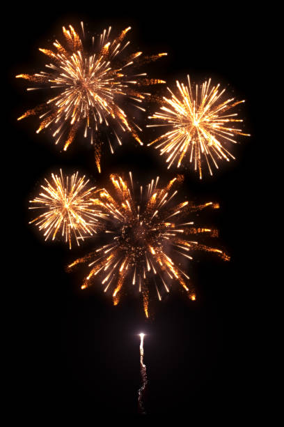 Beautiful golden fireworks with trail High-quality image of beautiful golden fireworks with trail isolated on the black background for overlay design of celebration new year or festivals gold layer stock pictures, royalty-free photos & images