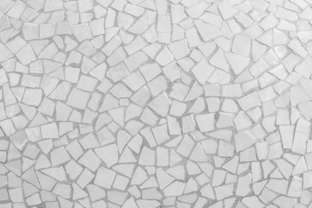 istock Broken tiles mosaic seamless pattern. White or Gray tile real wall high resolution real photo or brick seamless with texture interior background. Abstract wallpaper irregular in bathroom. 1073497266